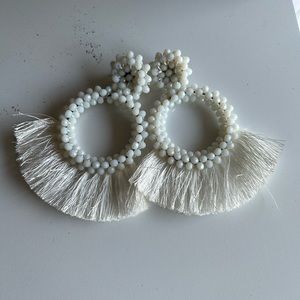 Fashion statement earrings. About 3in long, felt back.